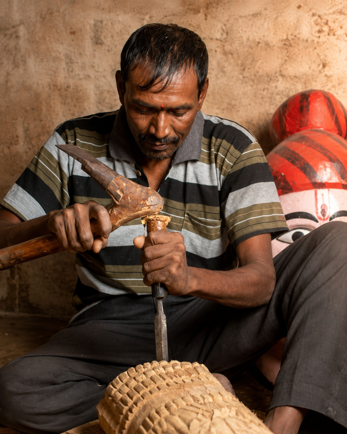 Village artisan creating a traditional handmade craft
